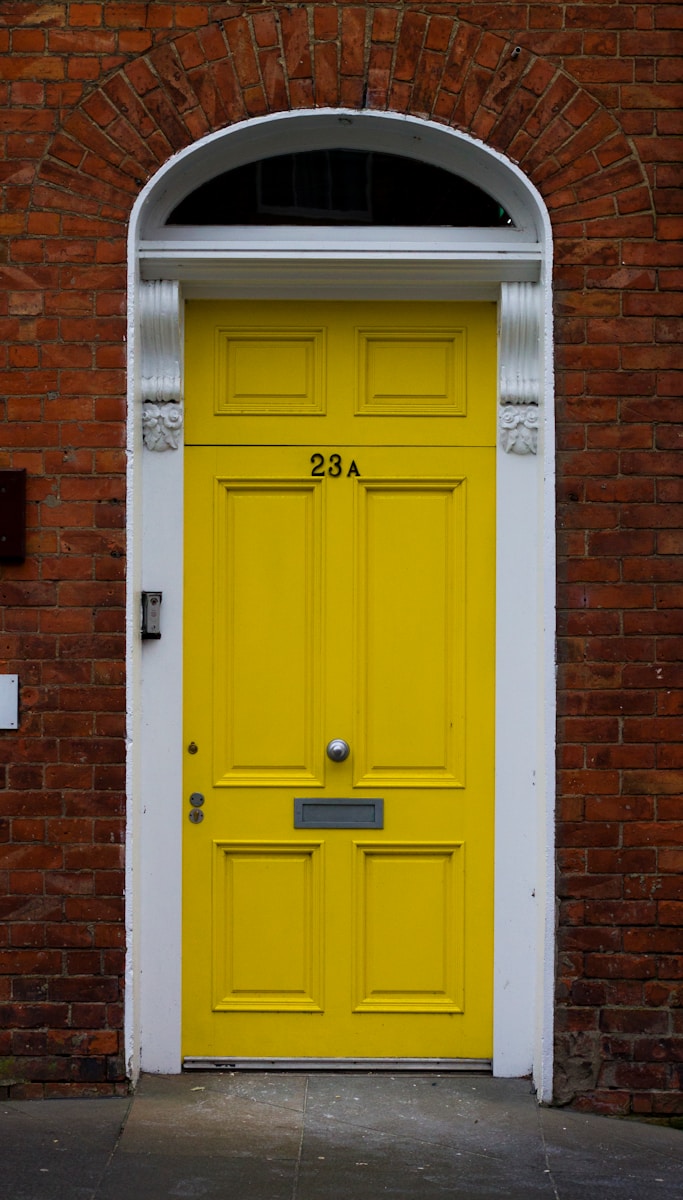 yellow wooden door is close